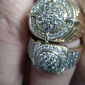 A set of men's diamond rings..